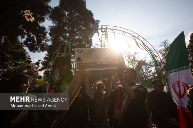 آیین تشیع وتدفین پیکر شهید گمنام در قزوین