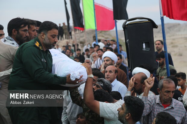 تشییع و خاکسپاری پیکر مطهر شهید گمنام در روستای پالور سیریک